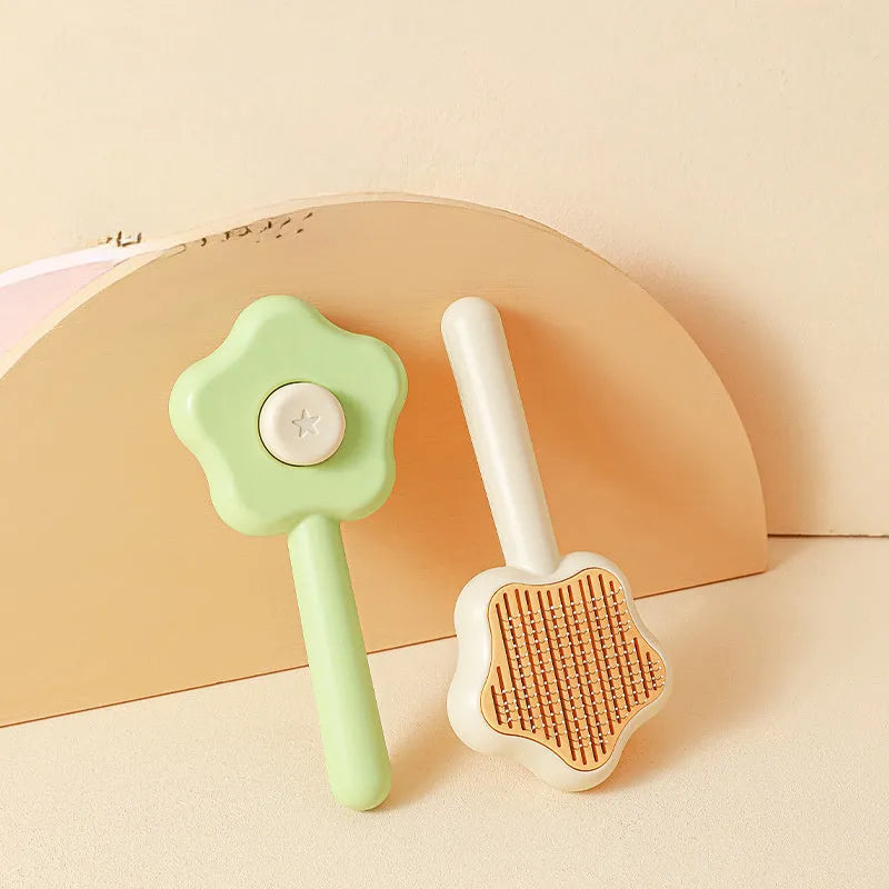 Magic Wand self-cleaning pet comb with stainless steel teeth in green colour