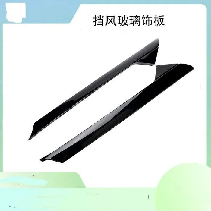 Black Ford front windshield trim panel set with part numbers BB5Z-7803144-AA and BB5Z-7803145-AA
