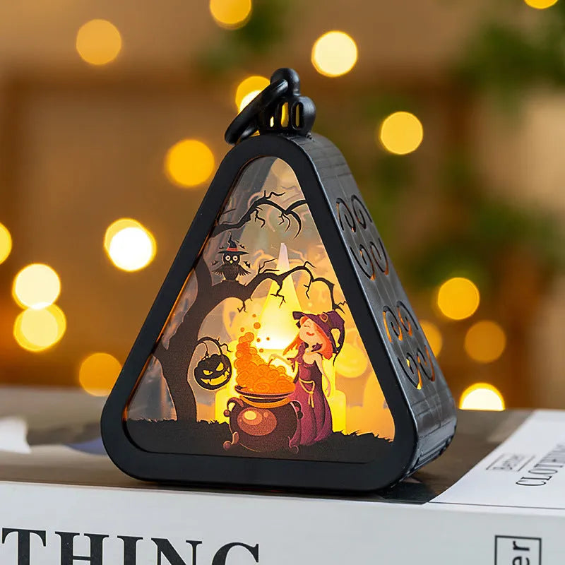 Portable Halloween pumpkin lamp decoration in pumpkin colour on a table