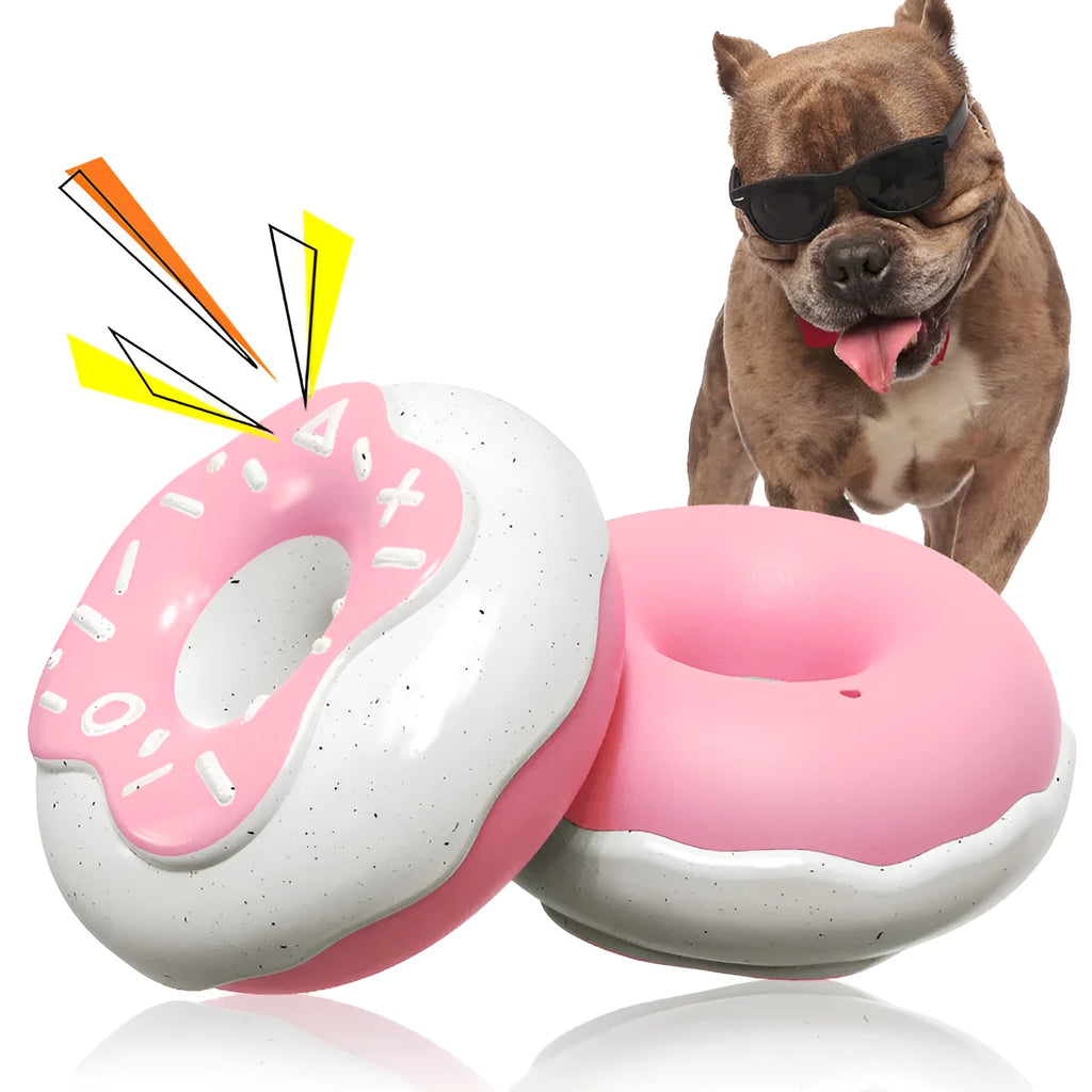 Pink TPR rubber donut dog chew toy with textured surface for dental cleaning