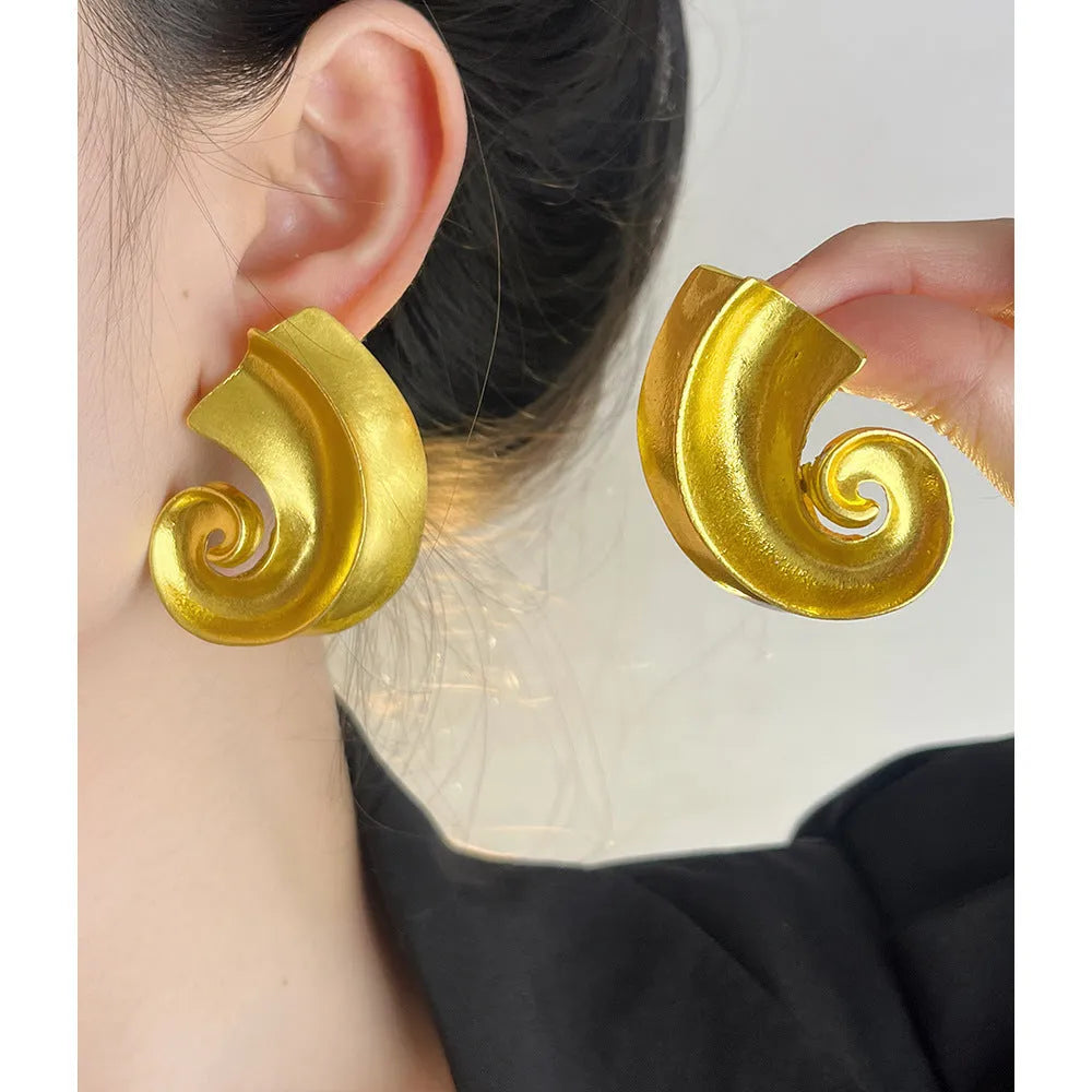 Retro geometric alloy ear studs in gold or silver colour, 5cm size.