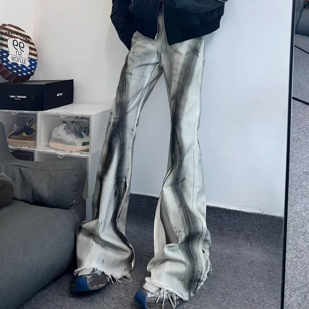 White jeans with black ribbon gradient detailing and heavy selvedge denim construction