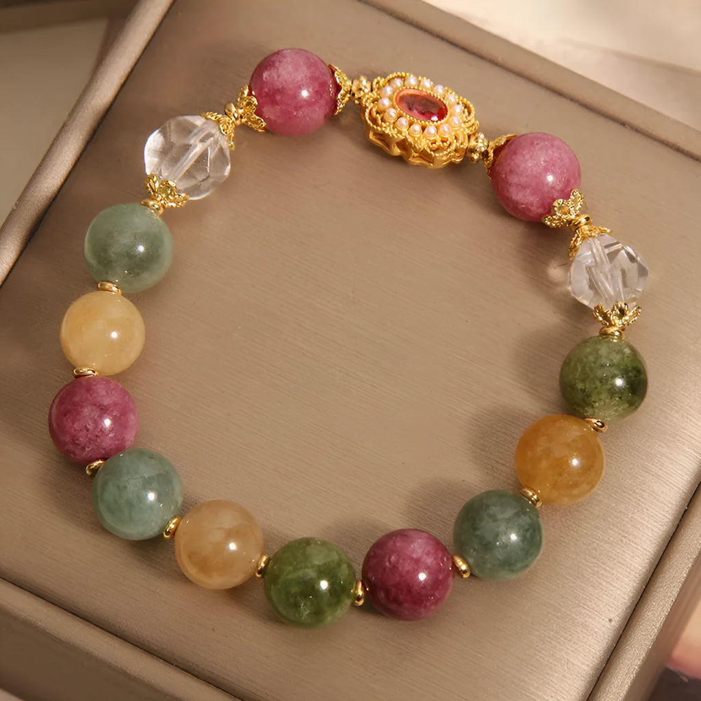 Women's jade colour tourmaline bracelet with alloy setting and rhinestone elements on pearl crystal base
