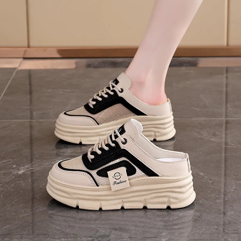Women's mesh half slippers in black with round toe design and height increasing insole