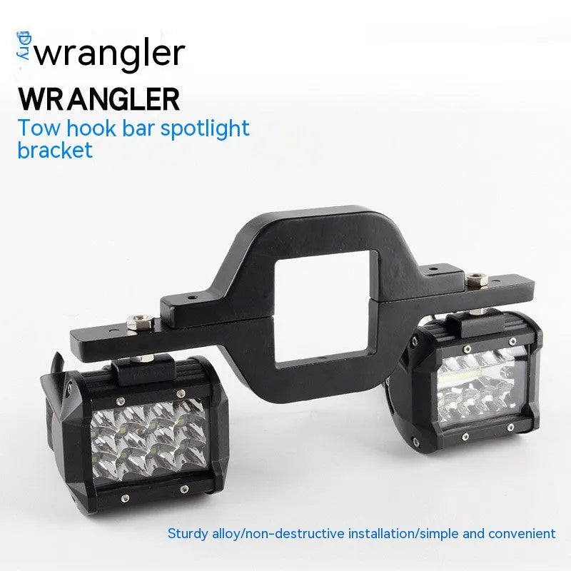 Black aluminium alloy LED reverse light mounting bracket for Jeep Wrangler.