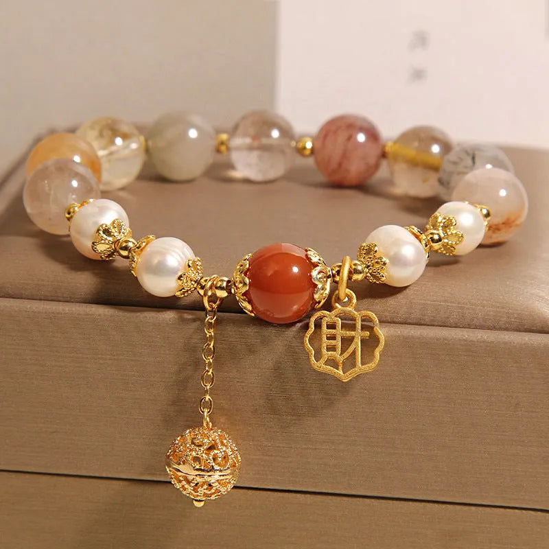Women's adjustable crystal pearl bracelet with four pearls and Chinese Cai charm in natural hair colours