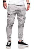 Men's light blue polyester casual trousers with elastic waistband and straight-leg loose fit