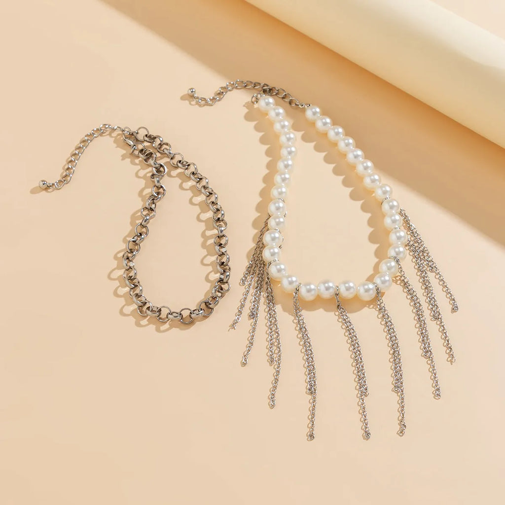 Women's double-layer retro necklace with white K electroplated finish, iron pendant, and imitation pearl tassel design