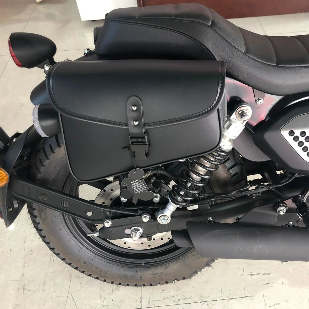 Black PU leather motorcycle swingarm bag mounted on Harley Sportster showing dimensions