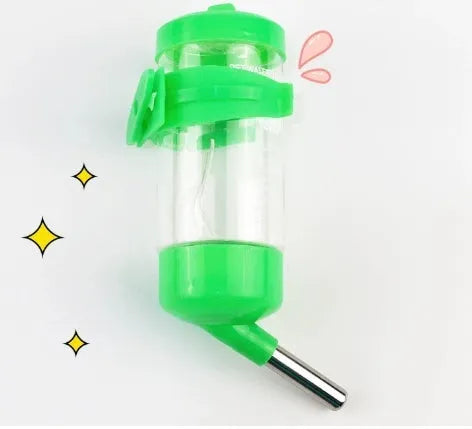 Green plastic ball kettle water feeder for small pets, shown attached to a cage.