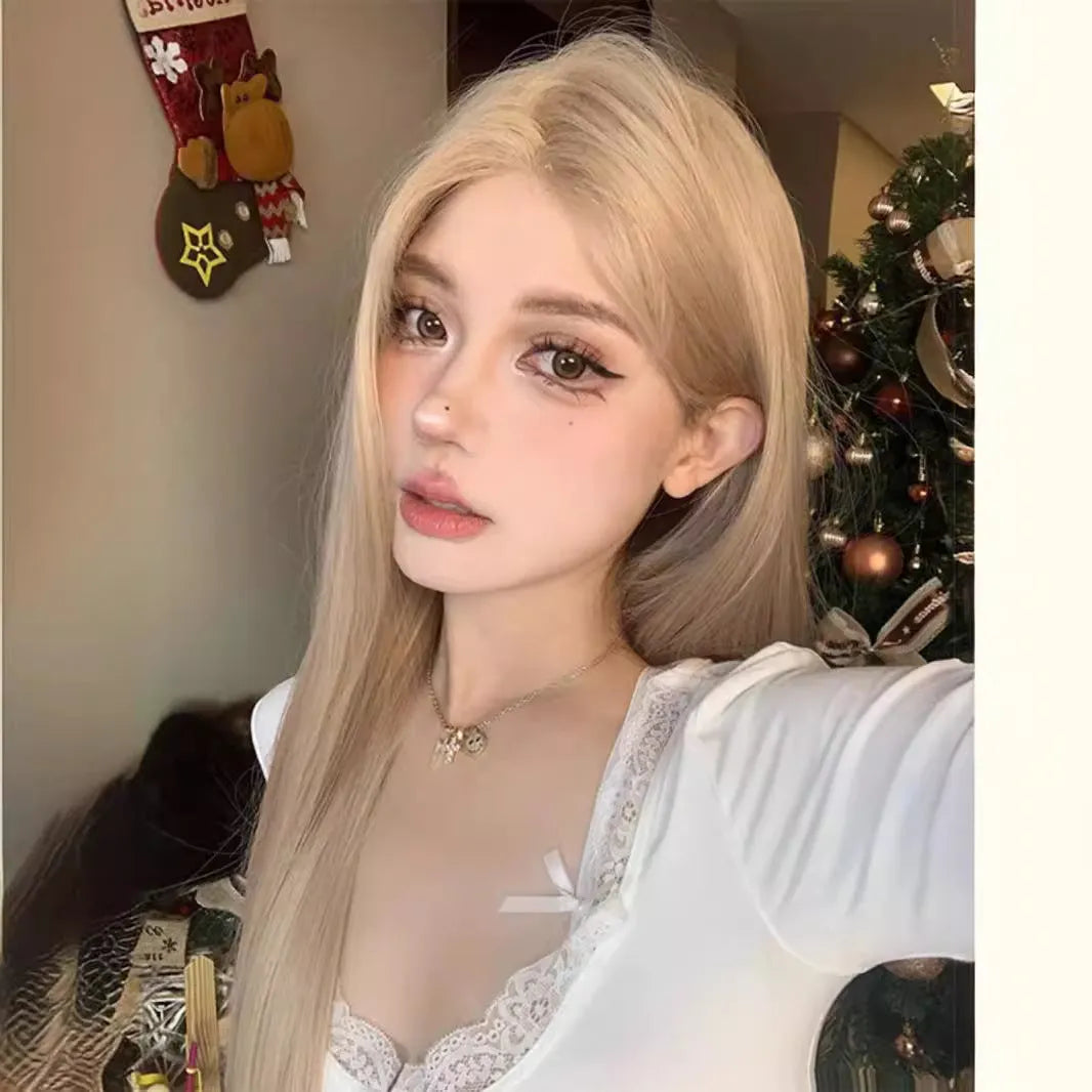 Women's long straight milk tea blonde gold wig with hair net on display