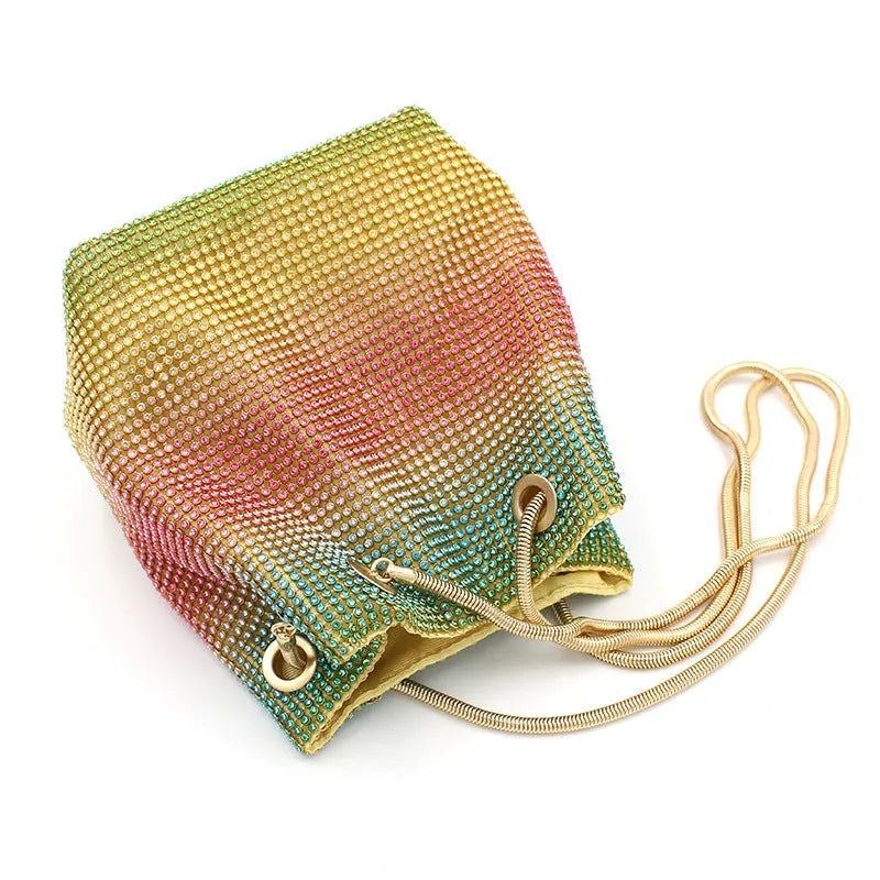 Colourful rainbow pattern rhinestone bucket bag with a soft texture.