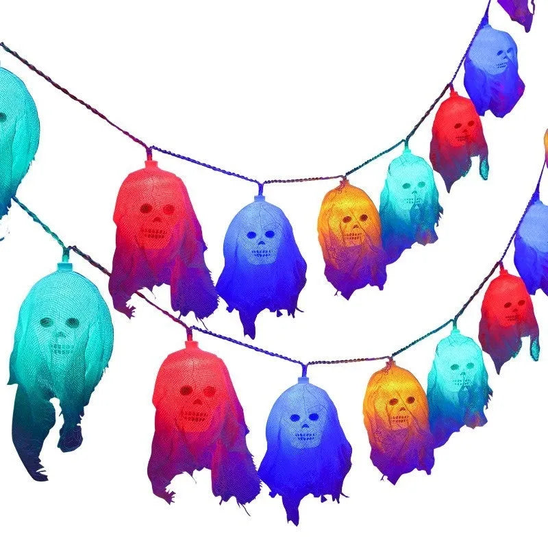 Halloween battery-operated coloured string lights with plastic shell for indoor wall decoration.