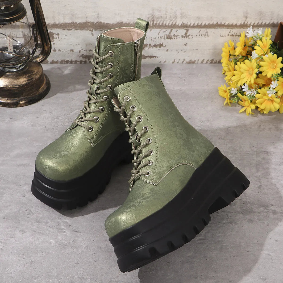 Women's white retro platform Martin boots with patchwork detail and a side zip.