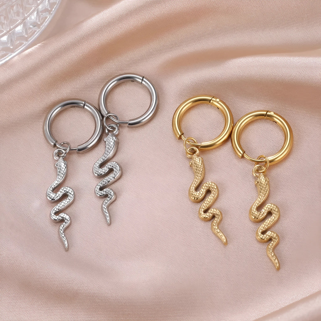 A pair of vintage-style snake-shaped earrings in stainless steel with a gold or steel electroplated finish.