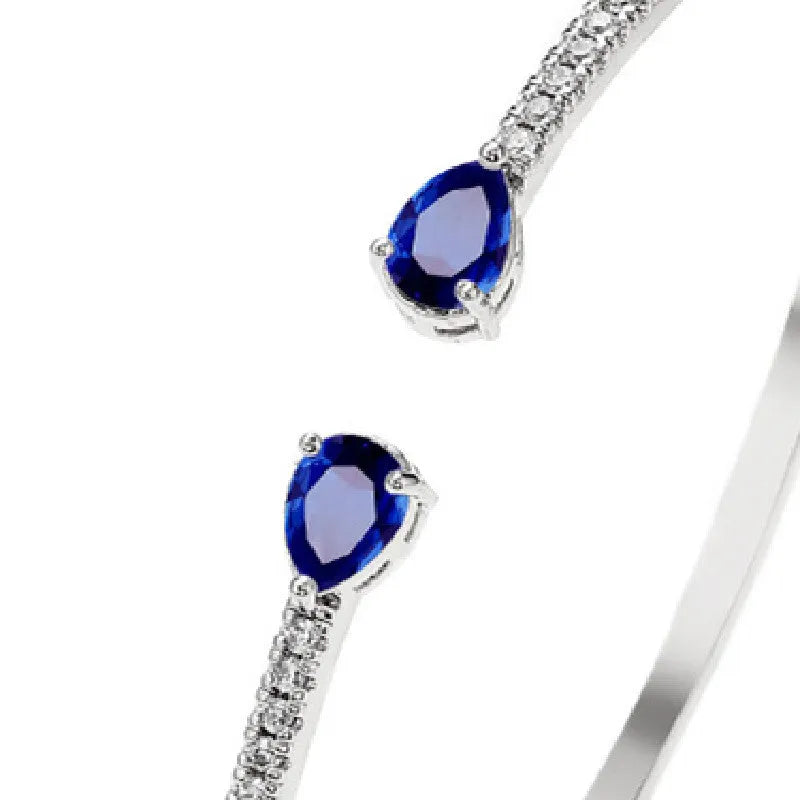 Multi-zircon personalised bracelet with inlaid stones on copper base in white and blue colour options