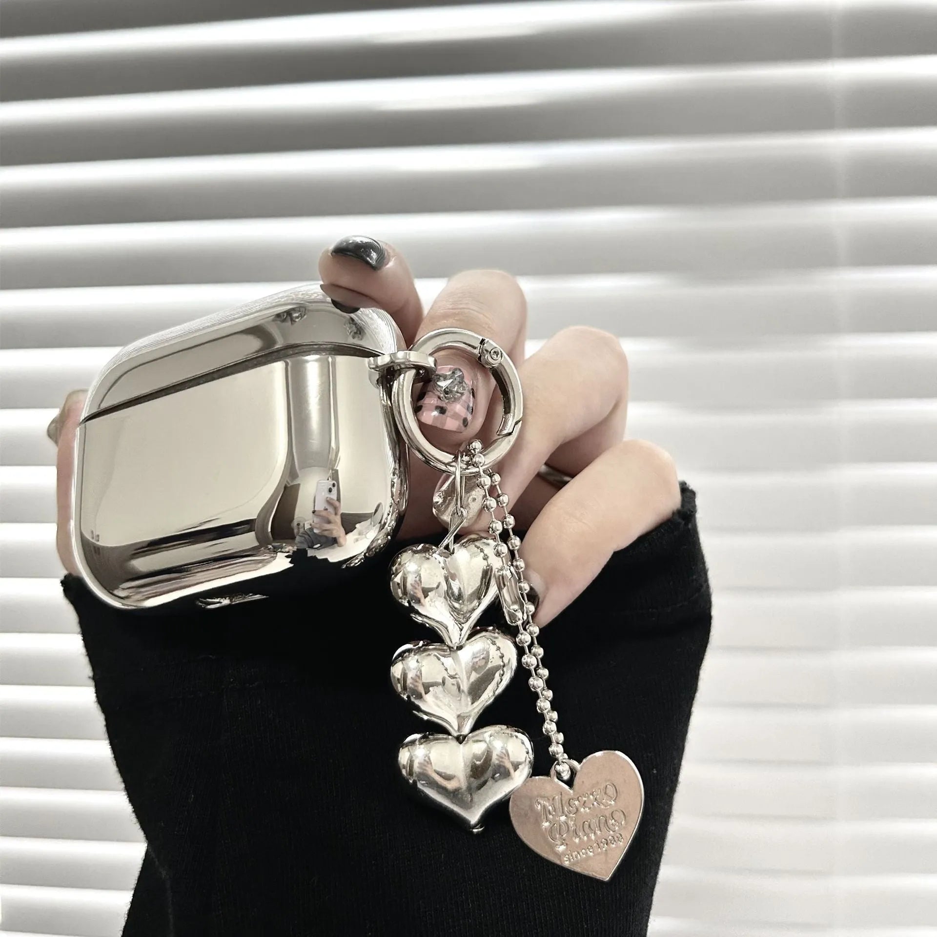 Electroplated solid colour TPU AirPods case with heart pendant charm and chain attachment