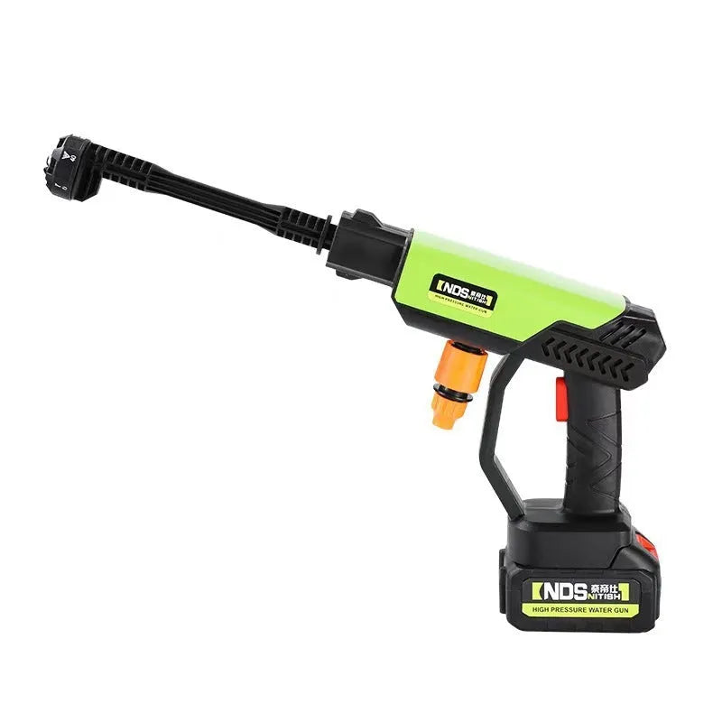 Green wireless high-pressure water gun with six-in-one metal nozzle and extension accessories.