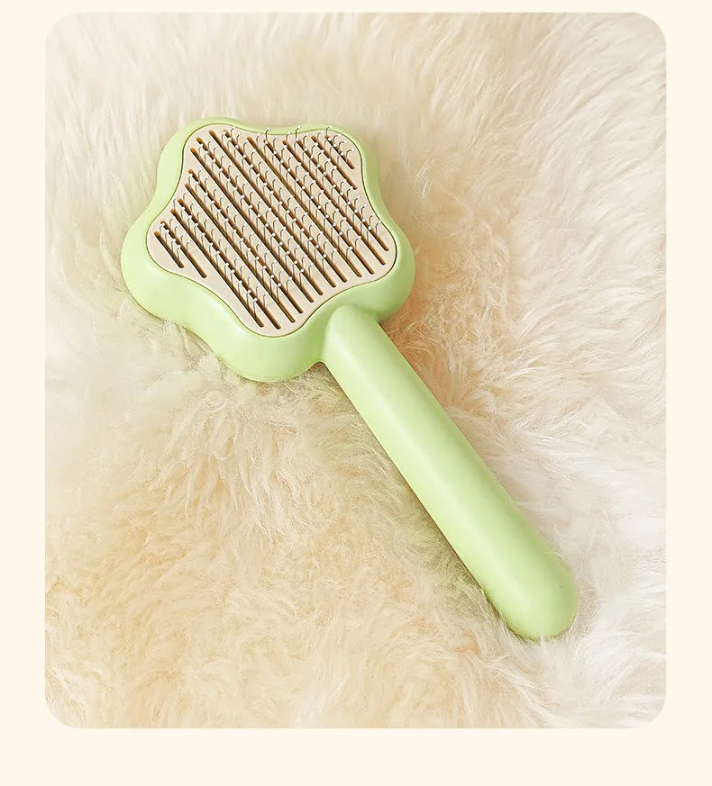 Magic Wand self-cleaning pet comb with stainless steel teeth in green colour
