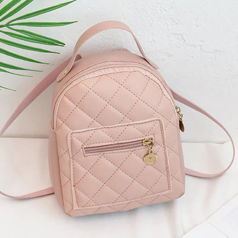 Girls' square hard PU backpack with embroidery, soft handle, in white, black, or pink.