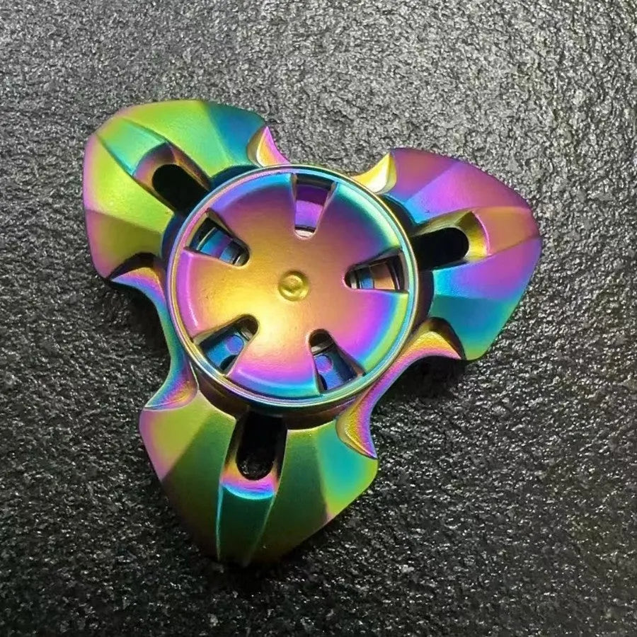 Alloy rotating fingertip gyro decompression toy in gun colour and colourful options for adult stress relief