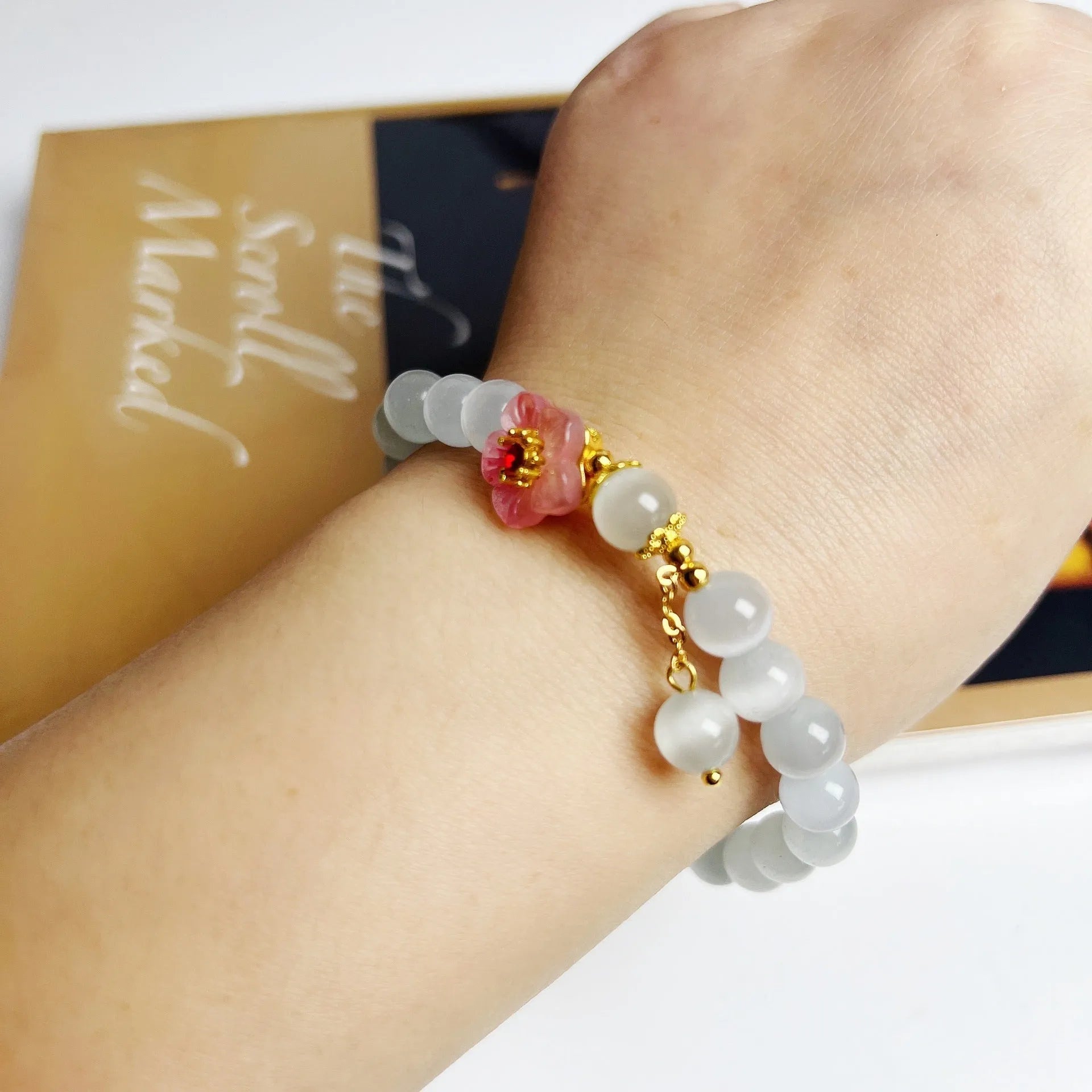 White opal flower beaded bracelet handmade from glass and coloured glaze jewellery