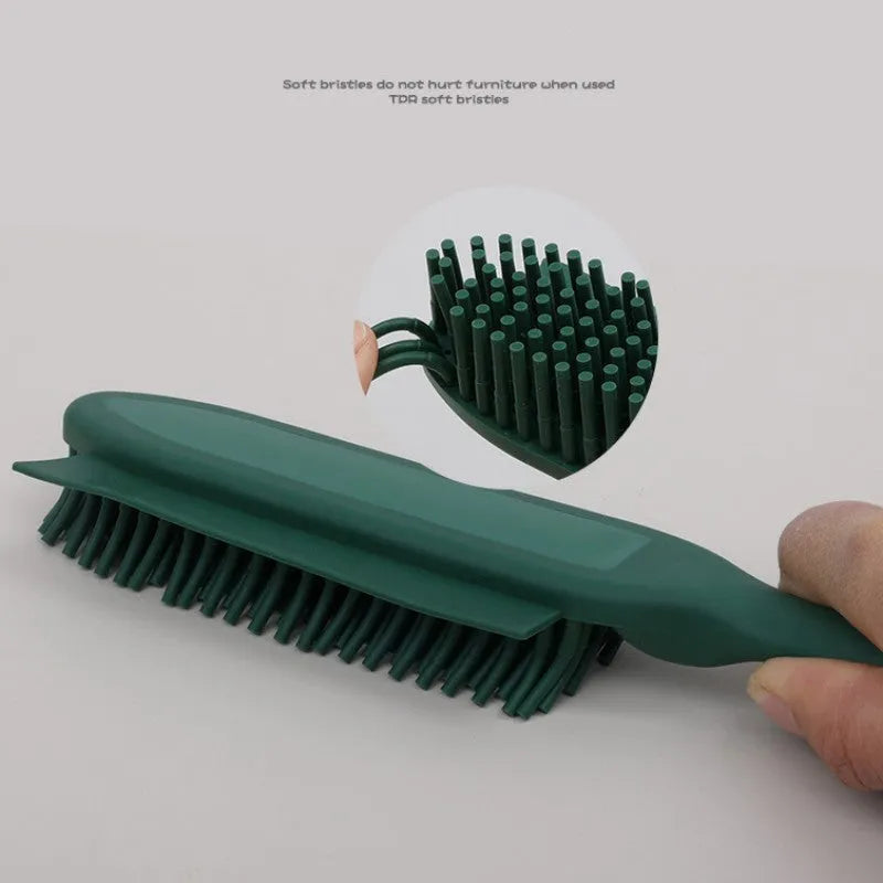 Green silicone pet brush with removable hair collector for grooming dogs, cats, and removing hair from clothes.