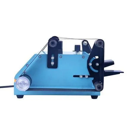 Blue desktop dual-axis belt sander on a workbench, a 750W sharpening and polishing tool.