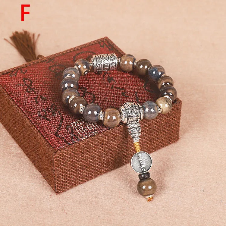 Men's ceramic gradient bead Buddhist charm bracelet with coloured glaze, approximately 13mm diameter.