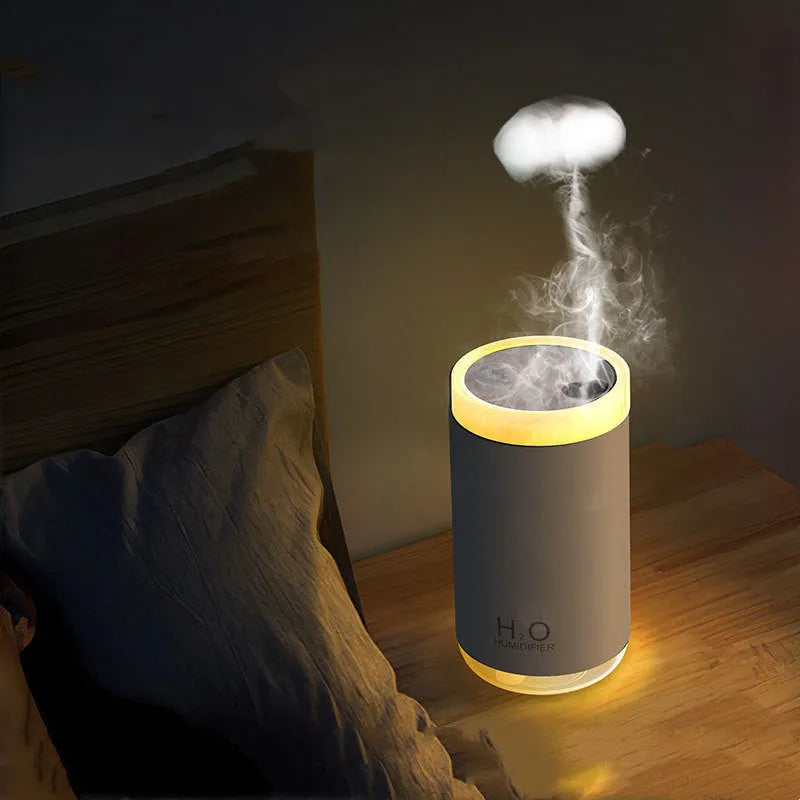 Jellyfish smoke ring humidifier with warm night light USB operation in blue pink white colours