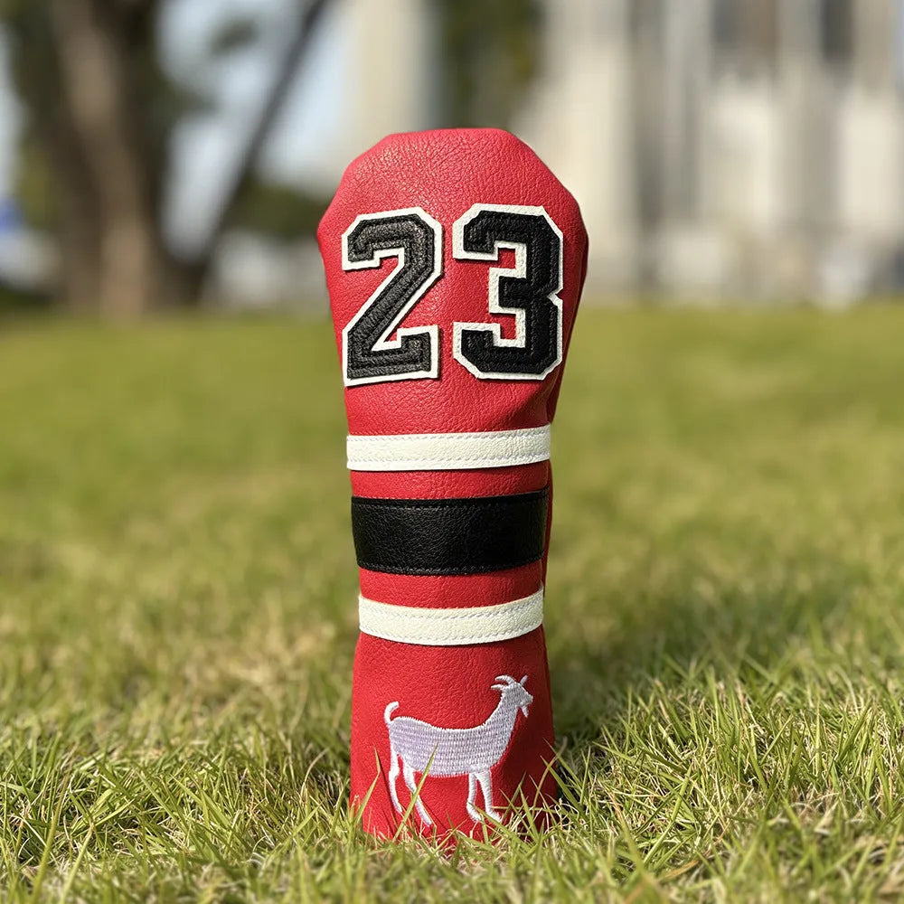 Set of coloured chicken drumstick design golf club head covers for fairway woods, a square putter, and irons.