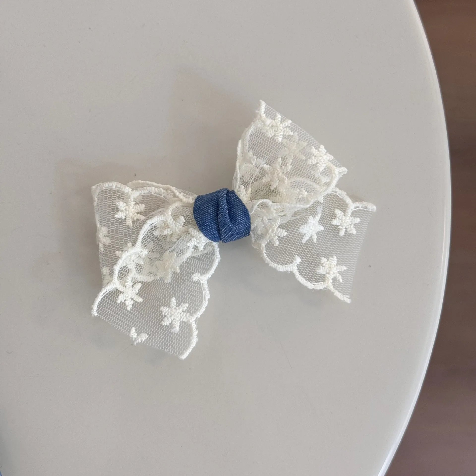 Hand-made pastoral cloth barrettes with beige lace and blue bow designs for women's hair