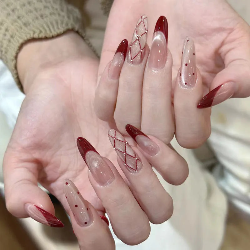 A selection of false nails in various colours and sweet girl style patterns, shown in packs of 5, 10, or 15 sets.
