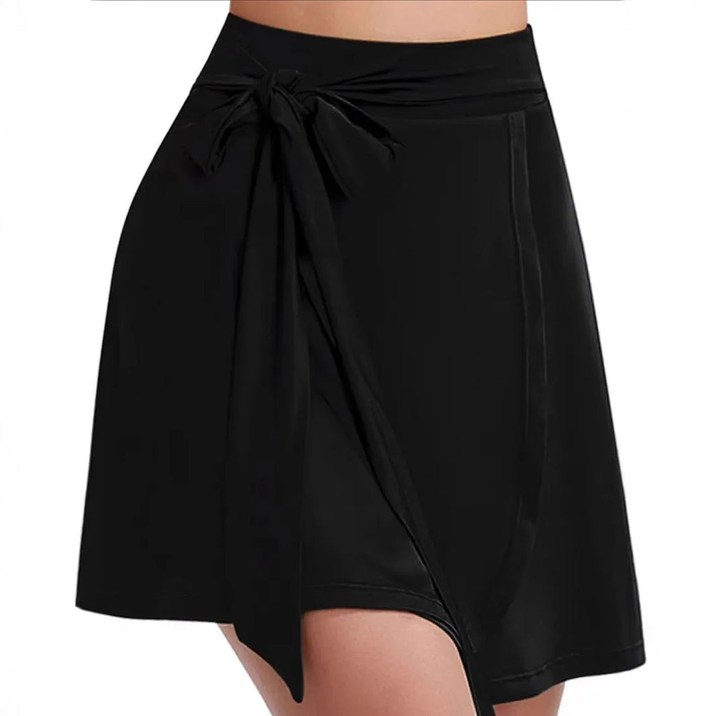 Black thigh-length sports skirt with anti-exposure shorts and shoulder strap details in Japanese Korean casual style