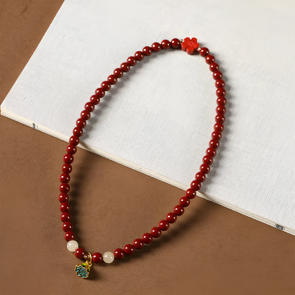 Purple gold cinnabar beads double circle bracelet with lotus seedpod design