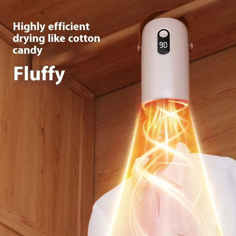 White portable household small cubic dryer with PTC heating on plain surface