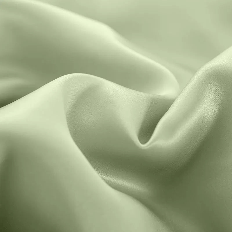 Silk duvet cover in six colour options showing double-sided bedding construction