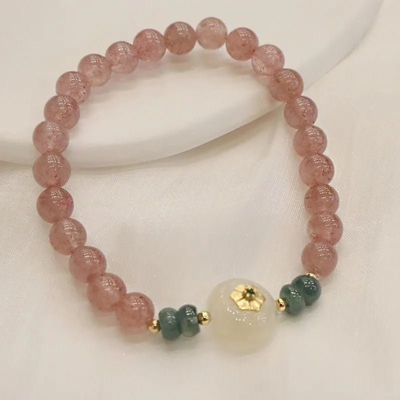 Women's strawberry quartz and blue water emerald bracelet with round jade pendant and geometric design