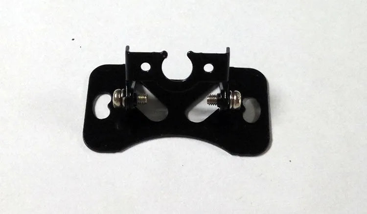 Black metal universal in-car camera holder with adjustable angle on a car windscreen.