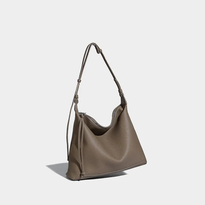 Large soft PU messenger bag in caramel colour showing 36cm length and shoulder strap