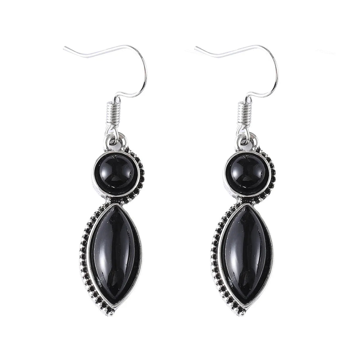 A pair of vintage geometric pendant earrings in black and purple with a Bohemian style.