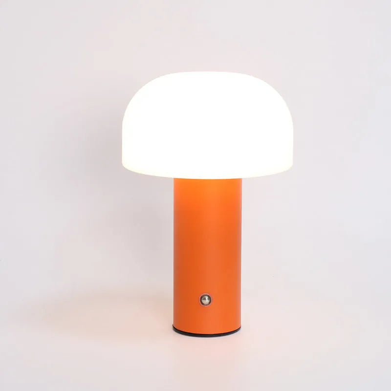 USB-powered plastic table lamp in a choice of black, green, orange, or white colour.