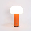 USB-powered plastic table lamp in a choice of black, green, orange, or white colour.