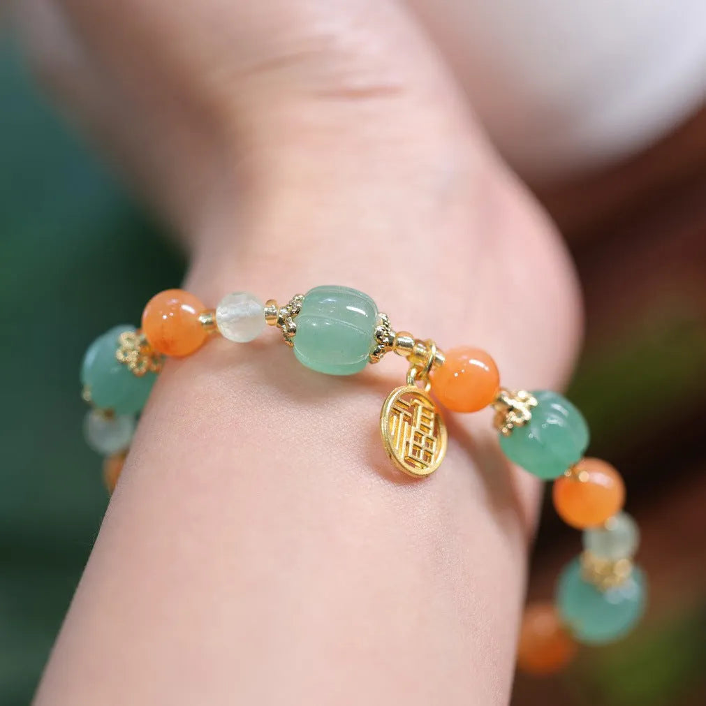 Jinsi Jade Duobao Pumpkin Bracelet with Prehnite stones for a 14-16.5cm wrist.