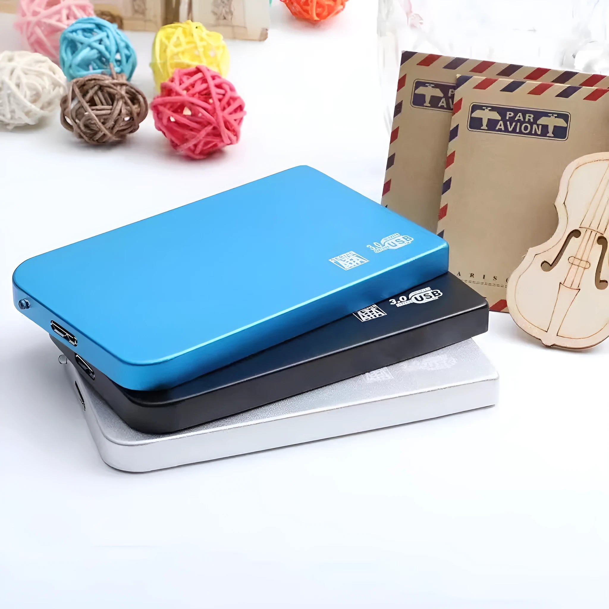 USB 3.0 external solid state drive with metal shell in black, blue, red, or silver colour options.