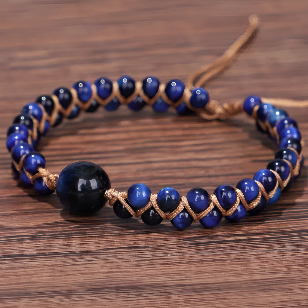 Handwoven geometric pull bracelet with blue tigereye stone beads on elastic band