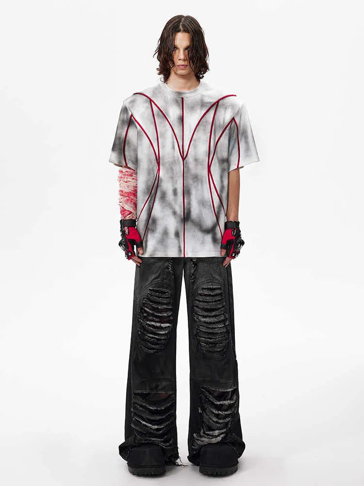 Short sleeve T-shirt with padded shoulders and three-dimensional line patchwork detail on a round neck