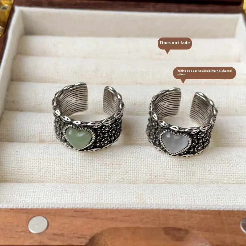 Retro style adjustable silver plated ring with heart design in white or green colour