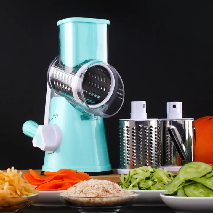 Manual kitchen mandoline slicer with round stainless steel blade in blue, green or red colours