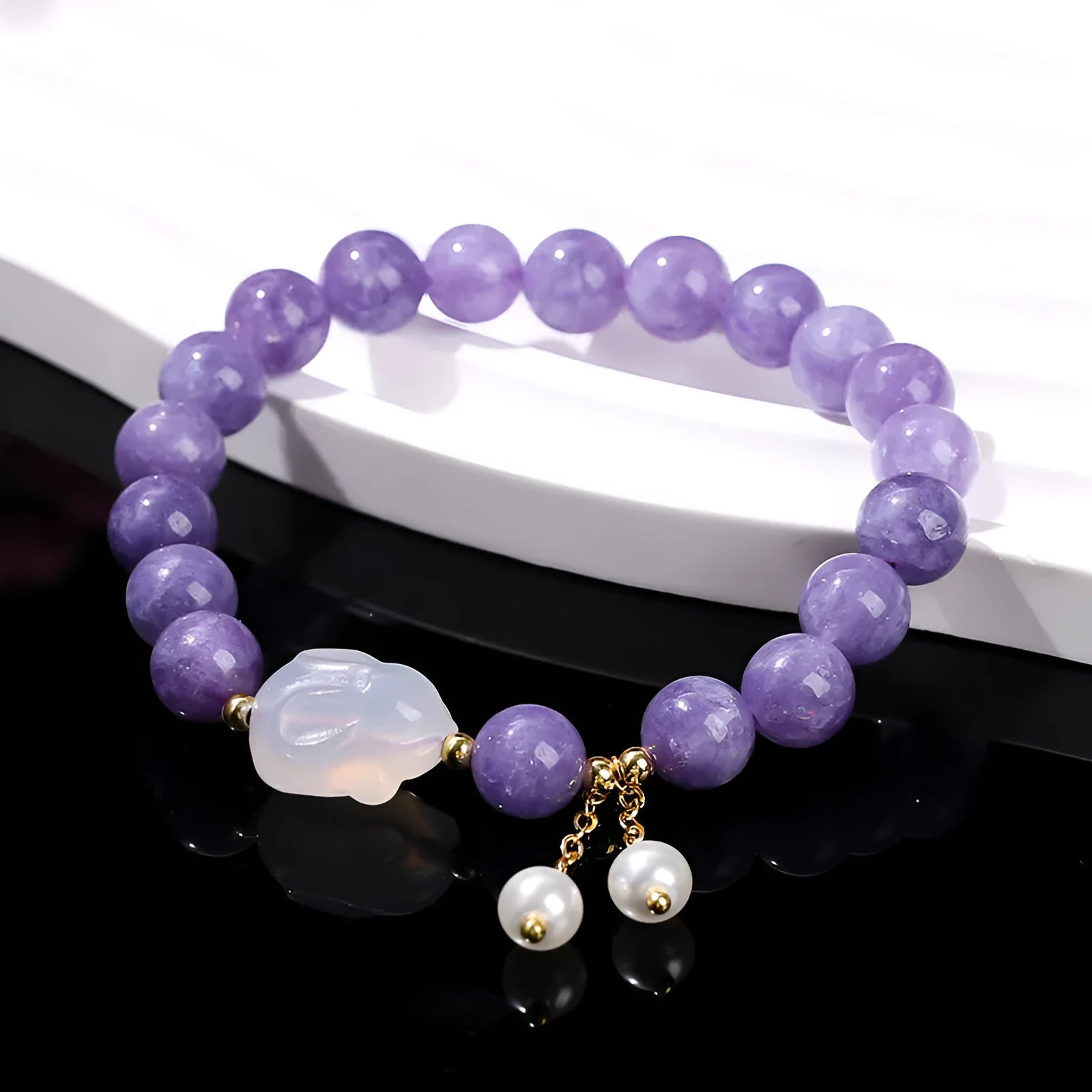 Purple aquamarine chalcedony bracelet with geometric beads and agate rabbit motif